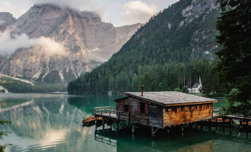Brown house on a lake